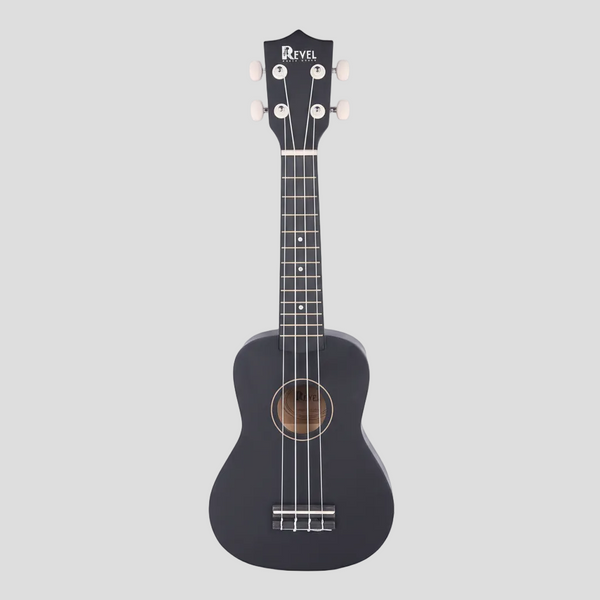 Black ukulele with Revel case on a white background
