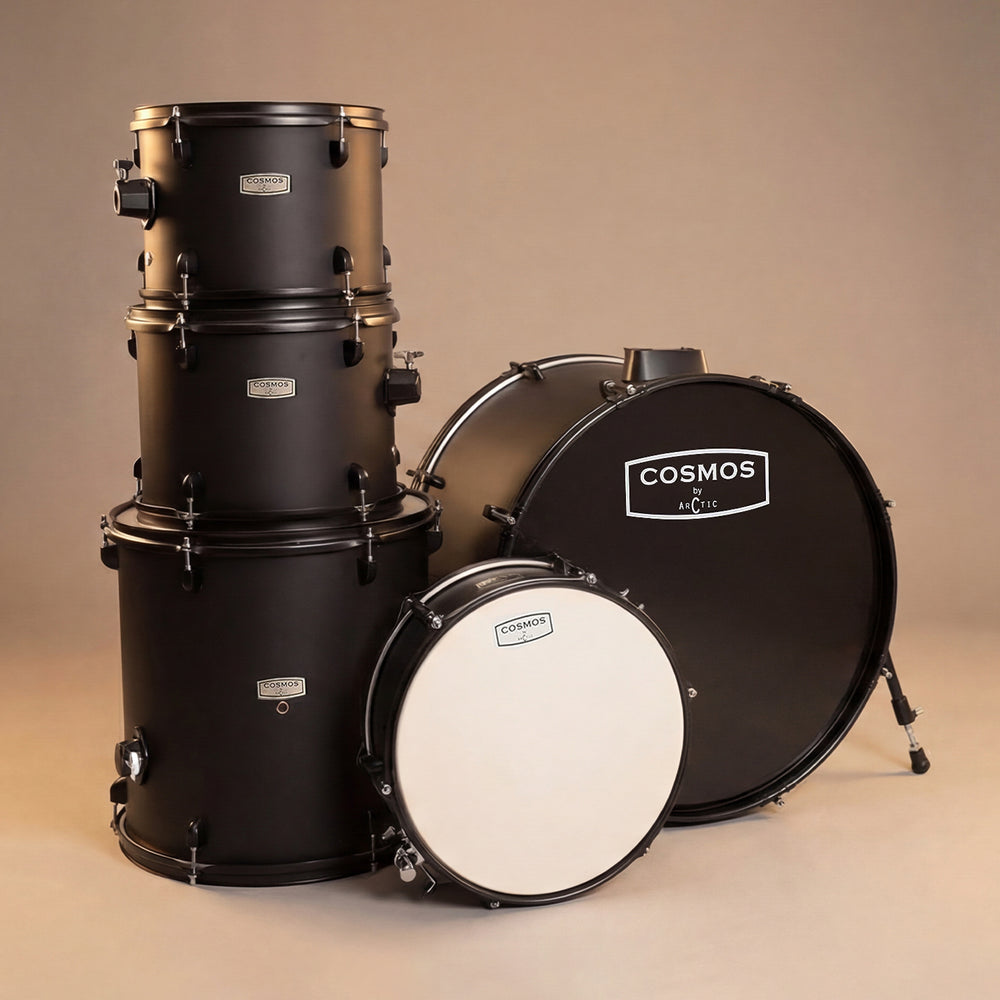 Close-up shot highlighting the premium glossy black wood shells, chrome lugs, and clean white drumheads of the rack toms.
