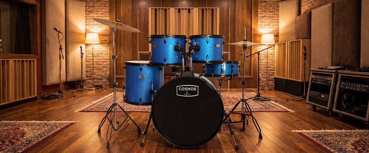 Side profile layout for desktop display of a deep blue acoustic drum kit, showcasing the sturdy double-braced stands, hi-hat pedal, and overall build quality.