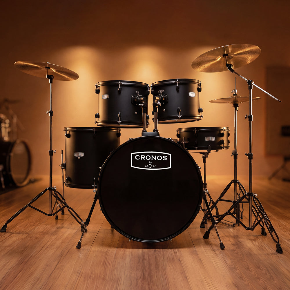 Three-quarter angled view of a black acoustic drum kit, highlighting the configuration of the rack toms, floor tom, and hardware.