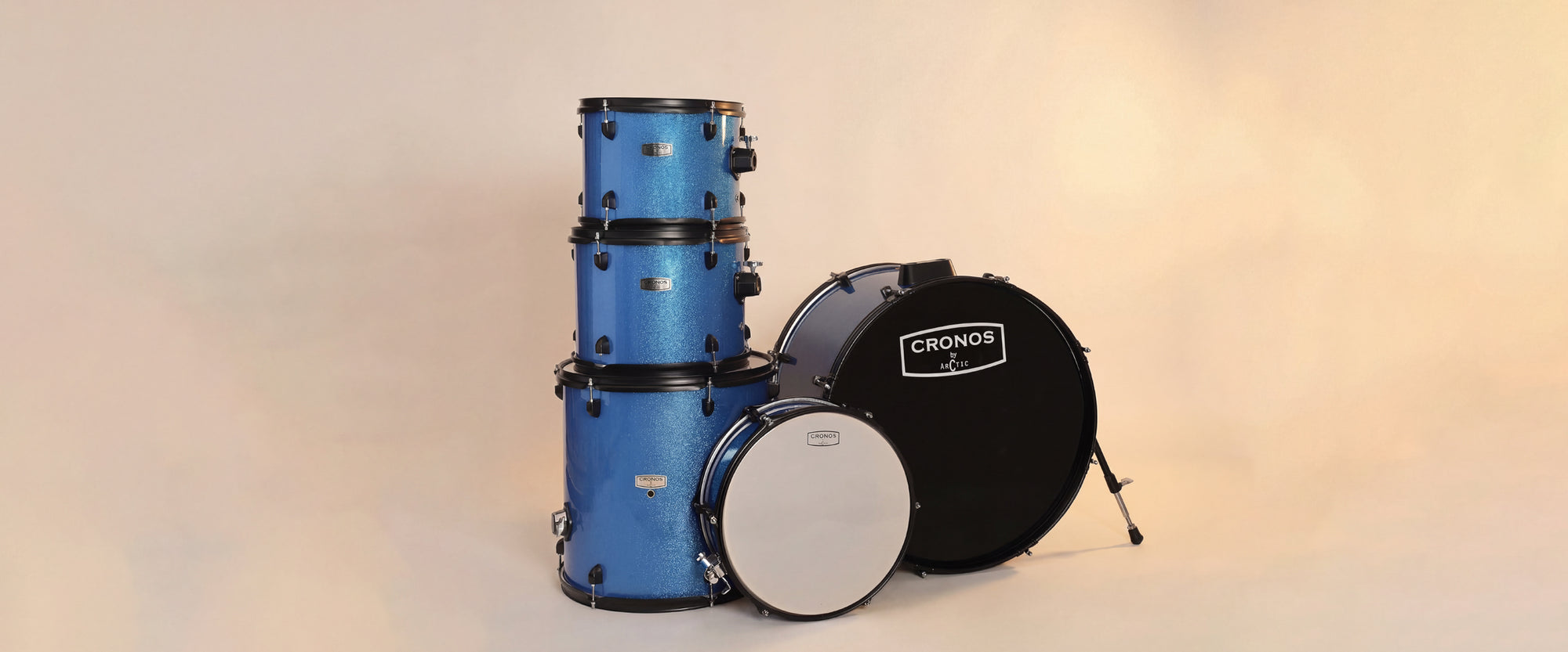 Close-up view of the metallic blue drum shells, showcasing the high-quality chrome lugs and hoops for desktop display.