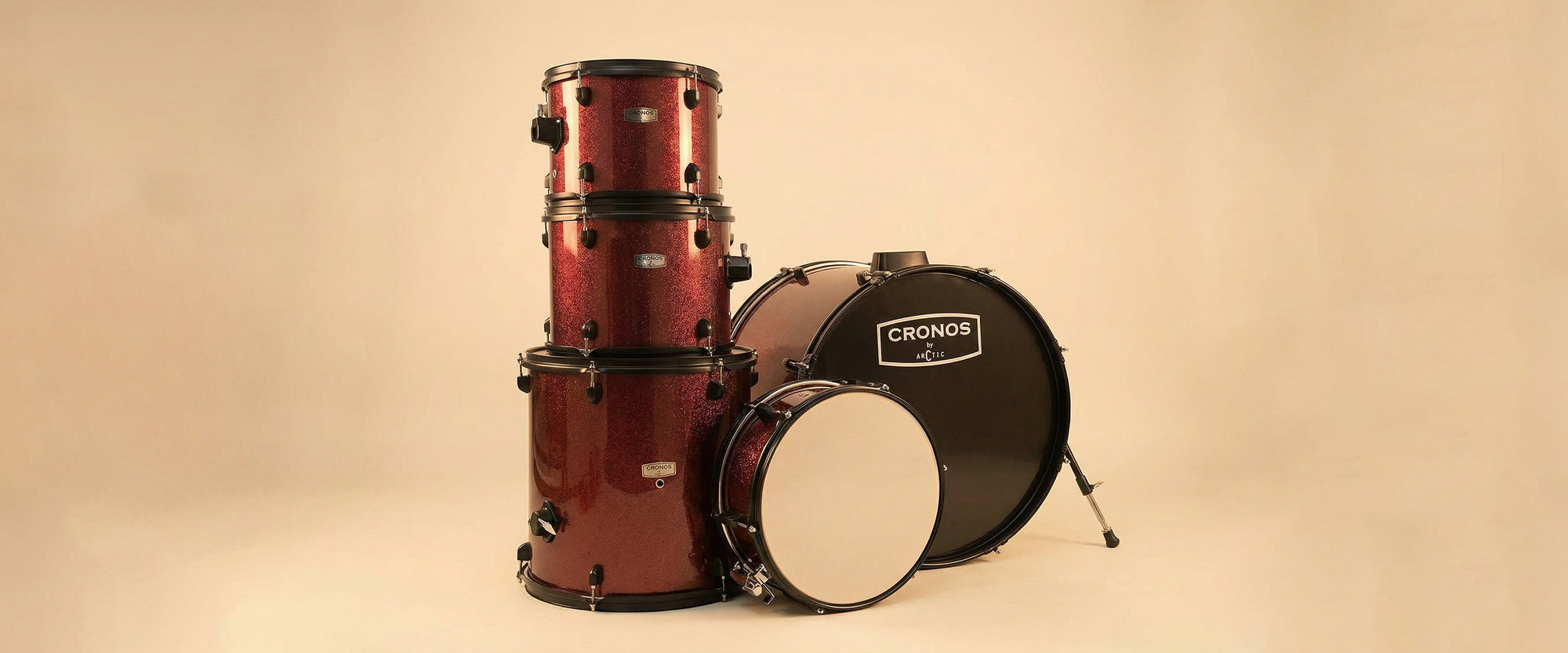 Close-up detail shot of the metallic red drum kit shells, showing the crisp white drumhead and polished chrome mounting system for desktop layout.