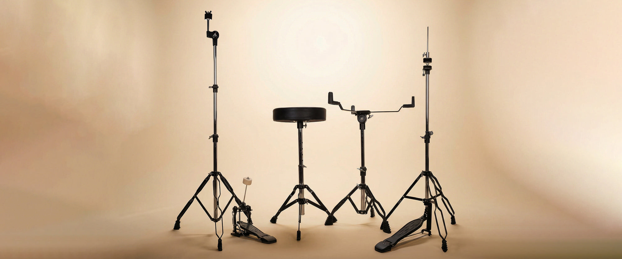 Rear view desktop display of a metallic red acoustic drum kit, showcasing the setup from the drummer’s seat, including the pedals and hardware configuration.