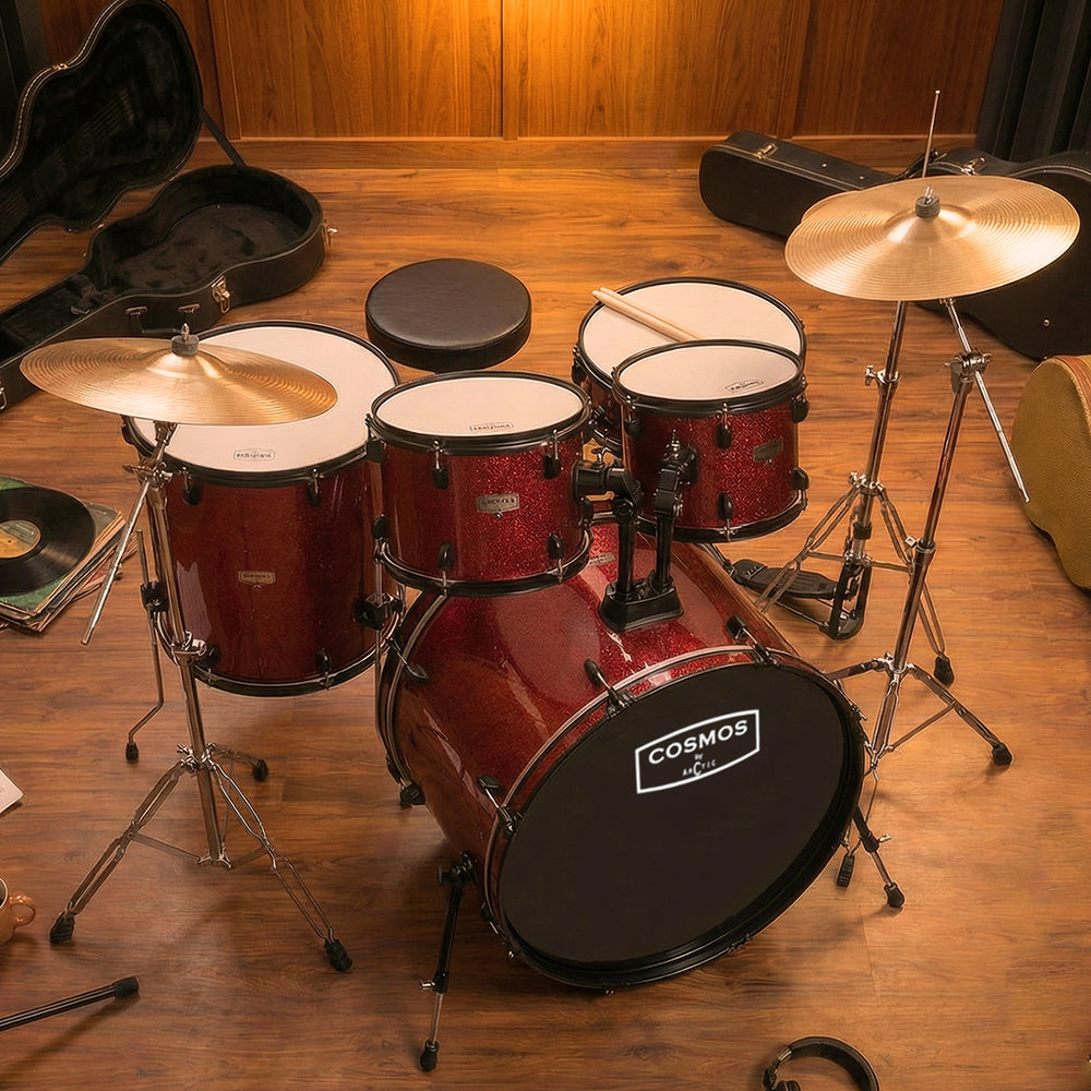 Three-quarter angled display of a metallic red 5-piece acoustic drum set, highlighting the modern shell finish and hardware.