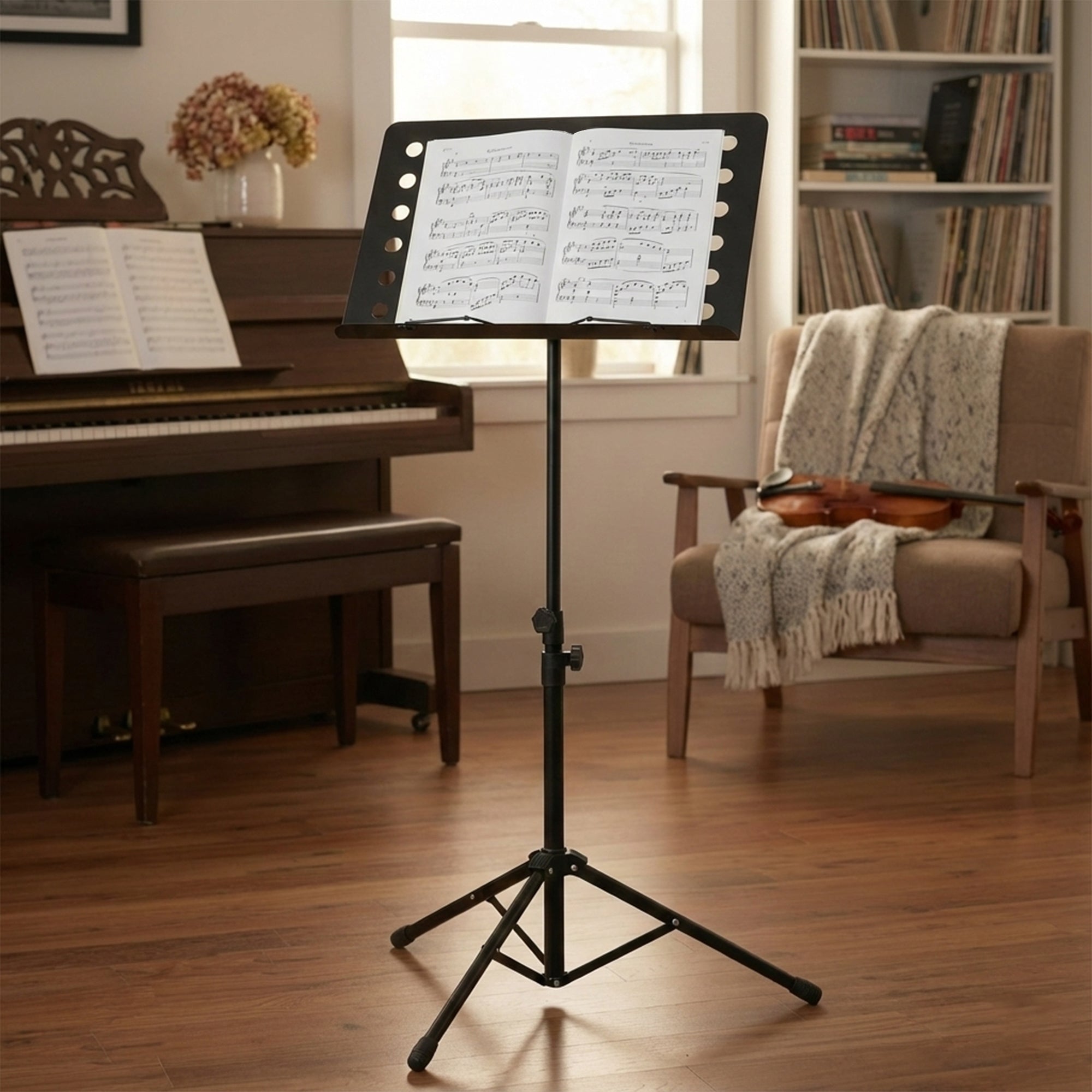 Music stand with sheet music in a room with a piano and chair.
