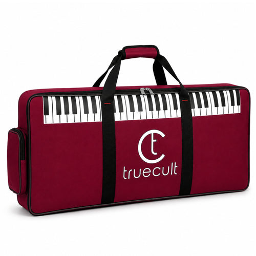 Red keyboard case with black keys and 'truecult' branding, accompanied by a music notebook.