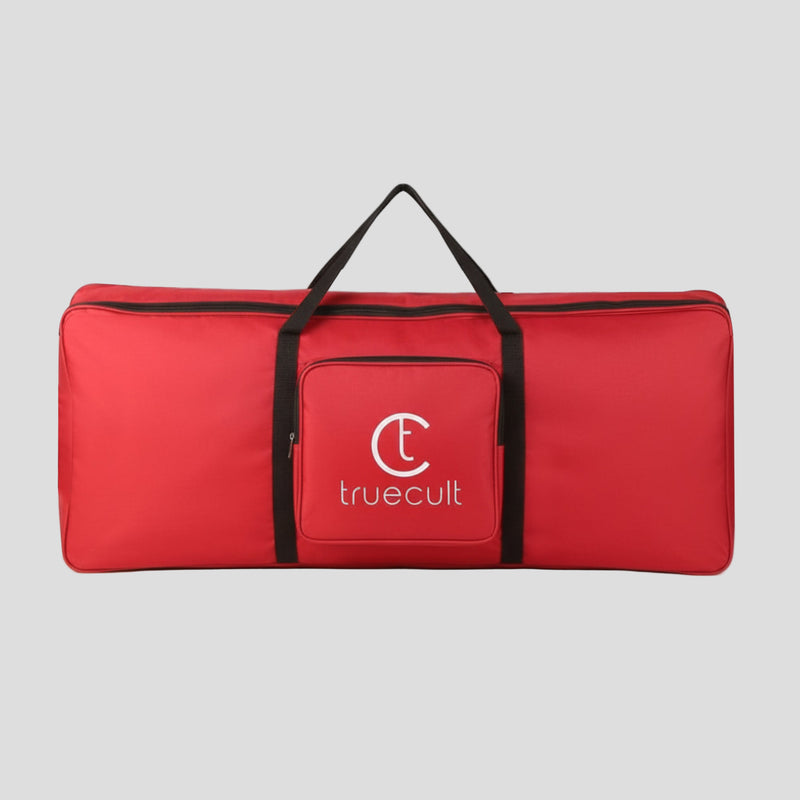 Red bag with black handles and 'truecult' logo on a white background