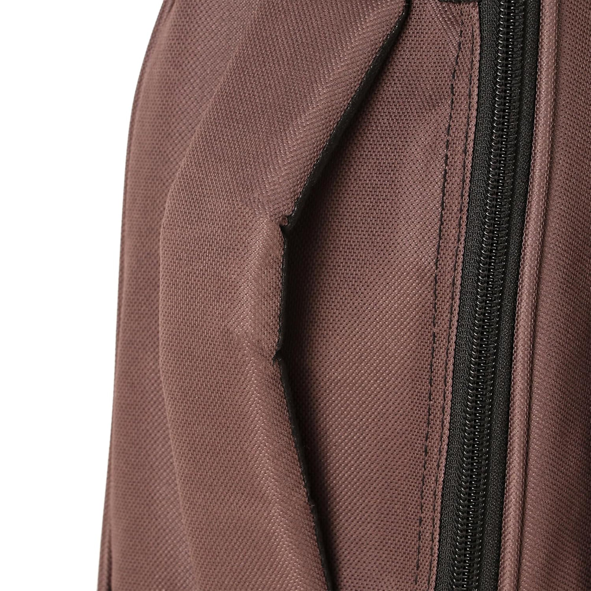 Close-up of a brown textured fabric with a black zipper on a white background Water-resistant acoustic guitar gig bag for yamaha kadence fender 