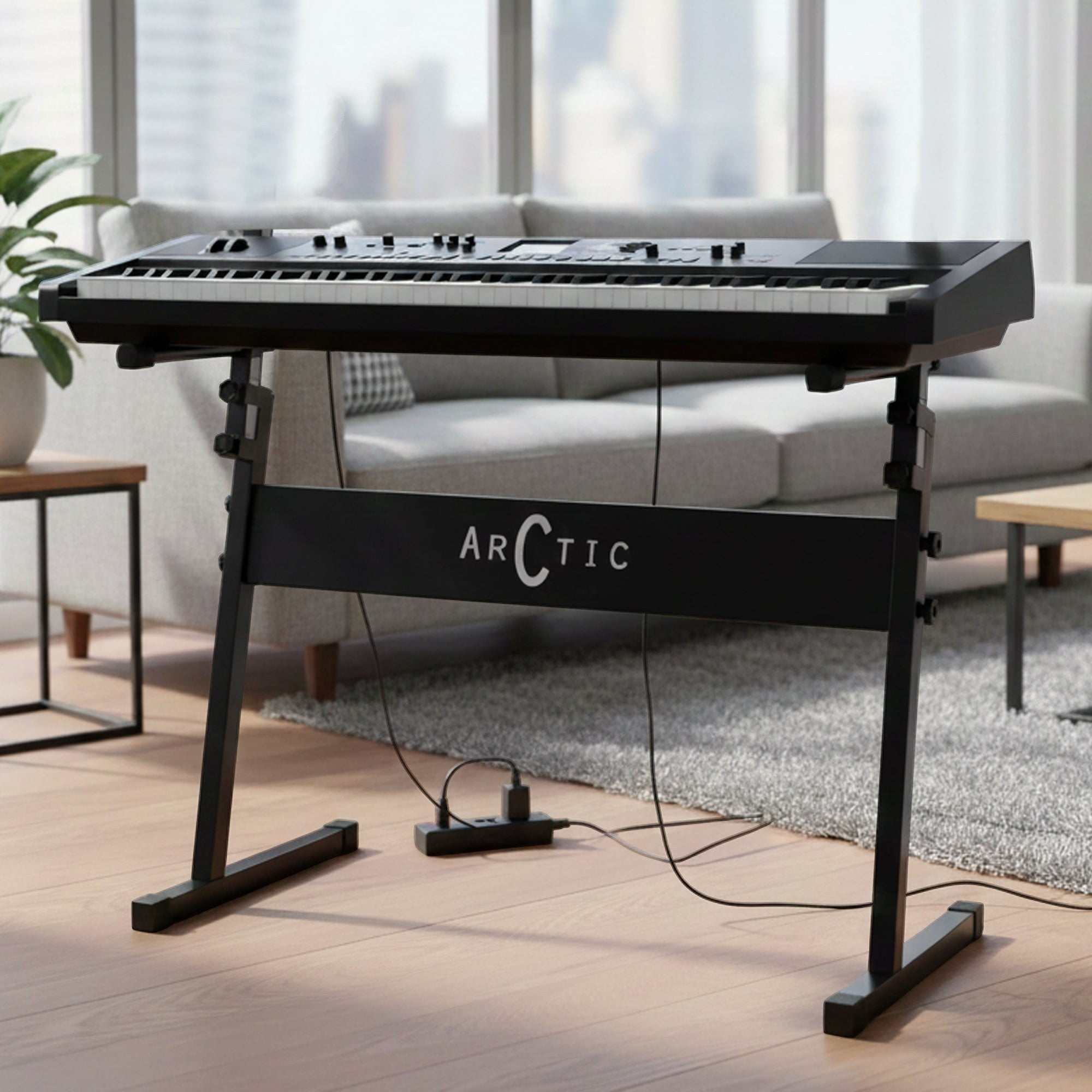 Guitar World Store Arctic AR-ZKS-03 heavy-duty black Z-style adjustable keyboard stand holding an 88-key digital piano.