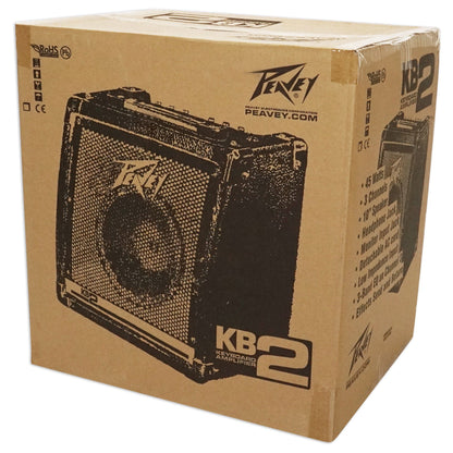 Cardboard box with Peavey keyboard amplifier design on a white background