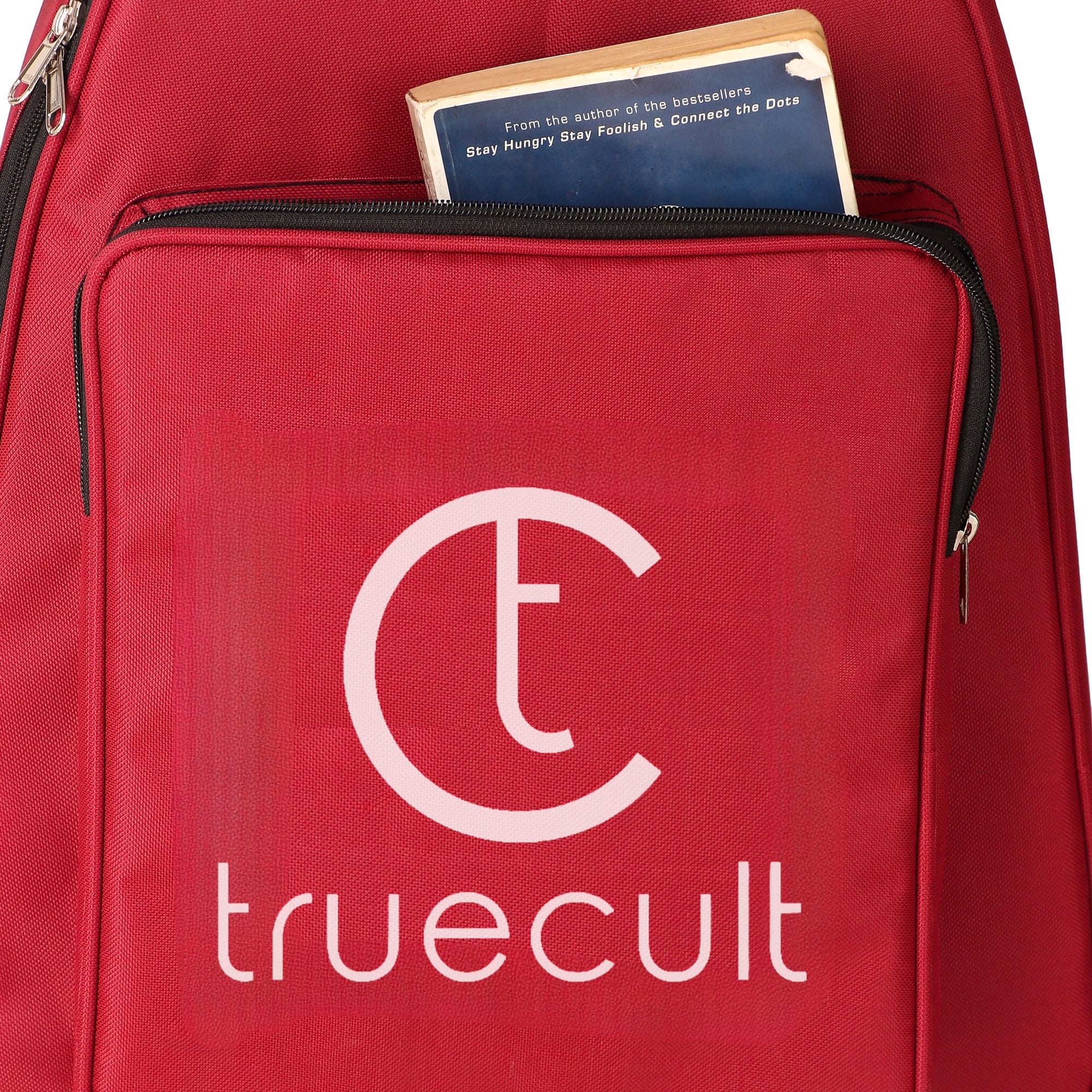 Red bag with 'truecult' logo and a book inside, on a white background Water-resistant acoustic guitar gig bag for yamaha kadence fender 