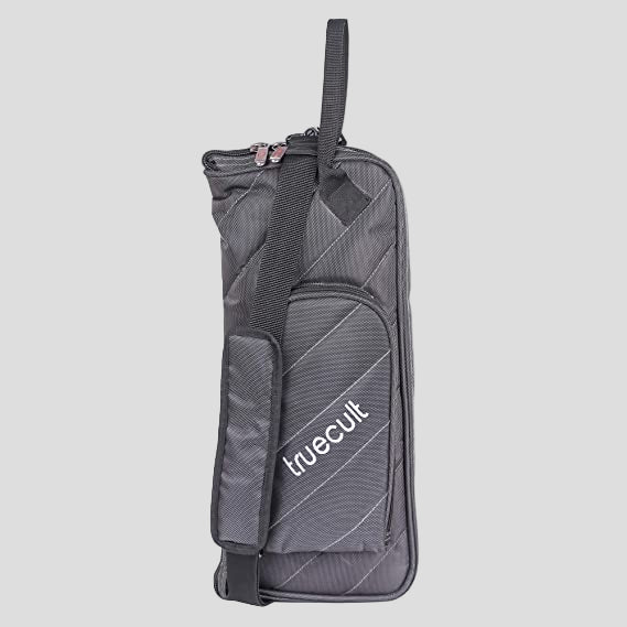 A black nylon drum stick bag with the 'truecult' brand logo, featuring a shoulder strap, carry handle, and an exterior pocket.